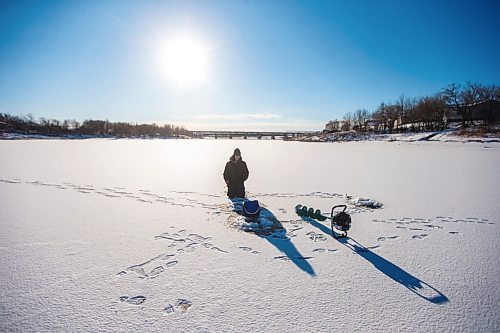 MIKAELA MACKENZIE / WINNIPEG FREE PRESS

Ethan Bartsch ice fishes on the Red River in Lockport on Friday, Dec. 3, 2021. He's already been fishing a half dozen times since the river froze about a week and a half ago. Standup.
Winnipeg Free Press 2021.