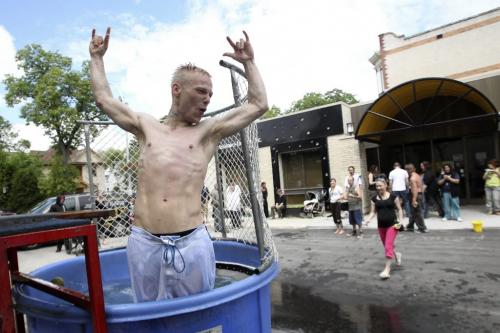 MIKE.DEAL@FREEPRESS.MB.CA 100615 - Tuesday, June 15th, 2010 Brian Carlson in the dunk tank at the BBQ during the grand opening of the Ray (Resource Assistance for Youth) centre at 125 Sherbrook Street. RaY offers a variety of services geared to the needs of "street entrenched youth." Some of the programs include; emergency services, warm meals and food, mental health and addiction support, a clothing and toiletries bank, employment support and more. MIKE DEAL / WINNIPEG FREE PRESS