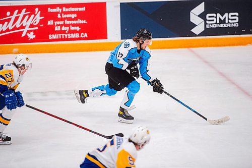 Mike Sudoma / Winnipeg Free Press
Winnipeg Ice left side, Owen Pederson, moves the puck down the ice as they take on the Saskatoon Blades at Wayne Flemming Arena Friday night
December 3, 2021