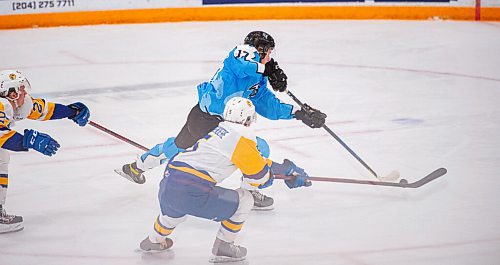 Mike Sudoma / Winnipeg Free Press
Winnipeg Ice left side, Owen Pederson, moves the puck down the ice as they take on the Saskatoon Blades at Wayne Flemming Arena Friday night
December 3, 2021