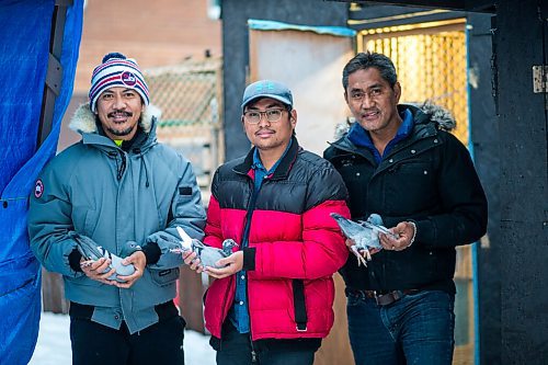 MIKAELA MACKENZIE / WINNIPEG FREE PRESS

Angelo Reyes (left), Ivan Reyes, and Alan Reyes pose for a portrait at their racing pigeon loft in Winnipeg on Friday, Nov. 26, 2021. For Ben Waldman story.
Winnipeg Free Press 2021.