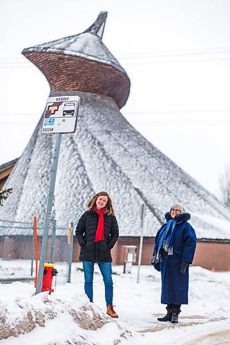 MIKAELA MACKENZIE / WINNIPEG FREE PRESS

Julie Penner, audio producer, and Susan Algie, executive director of the Winnipeg Architecture Foundation, pose for a portrait at a #10 bus stop in front of Precious Blood church in Winnipeg on Wednesday, Dec. 8, 2021. The two worked on Archi10, a new app that delivers an audio tour of local buildings while travelling along the #10 bus route. For Eva story.
Winnipeg Free Press 2021.