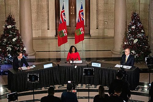 Daniel Crump / Winnipeg Free Press. (L to R) Dr. Peter MacDonald, chair, Diagnostic and Surgical Recovery Task Force Steering Committee, Health and Seniors Care Minister Audrey Gordon, Matthew Lister, project team director, Diagnostic and Surgical Recovery Task Force speak at an announcement in the rotunda at the Manitoba legislative building in Winnipeg. December 8, 2021.