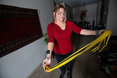 Daniel Crump / Winnipeg Free Press. Veronika Kanya holds her jujitsu black belt. Kanya, who became blind at age 25, is a self defence instructor. December 8, 2021.