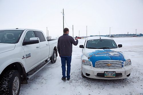 MIKE DEAL / WINNIPEG FREE PRESS
An employee of Haskett Growers photographs Winnipeg Free Press car after reporter requested to speak to Harold Thiessen at their office south of Winkler, MB.
211208 - Wednesday, December 08, 2021.