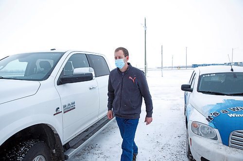 MIKE DEAL / WINNIPEG FREE PRESS
An employee of Haskett Growers photographs Winnipeg Free Press car after reporter requested to speak to Harold Thiessen at their office south of Winkler, MB.
211208 - Wednesday, December 08, 2021.