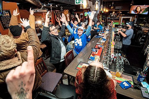 Mike Sudoma / Winnipeg Free Press
Winnipeg Blue Bombers fans rejoice at the Kingshead Pub Sunday evening as the Bombers take the Hamilton Tiger Cats in overtime to win the 2021 Grey Cup
December 12, 2021
