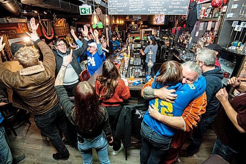 Mike Sudoma / Winnipeg Free Press
Winnipeg Blue Bombers fans rejoice at the Kingshead Pub Sunday evening as the Bombers take the Hamilton Tiger Cats in overtime to win the 2021 Grey Cup
December 12, 2021