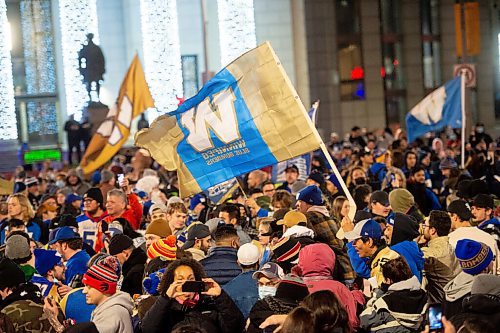 Mike Sudoma / Winnipeg Free Press
Blue Bombers fans young and old congregate at Portage and Main to celebrate the Bombers 3rd consecutive year as Grey Cup Champions Sunday evening
December 12, 2021