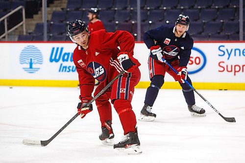 MIKE DEAL / WINNIPEG FREE PRESS
Winnipeg Jets' Neal Pionk (4) during practice at Canada Life Centre Monday morning.
211213 - Monday, December 13, 2021.