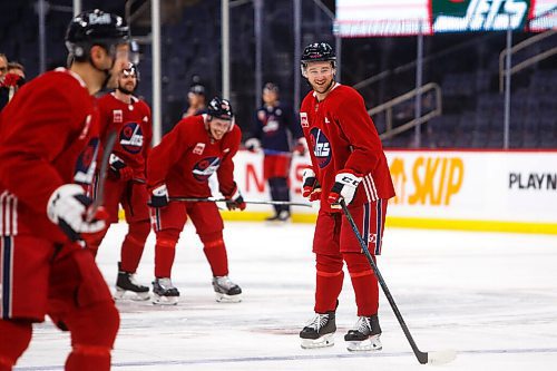 MIKE DEAL / WINNIPEG FREE PRESS
Winnipeg Jets' Neal Pionk (4) during practice at Canada Life Centre Monday morning.
211213 - Monday, December 13, 2021.