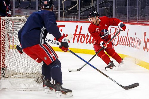 MIKE DEAL / WINNIPEG FREE PRESS
Winnipeg Jets' Neal Pionk (4) during practice at Canada Life Centre Monday morning.
211213 - Monday, December 13, 2021.