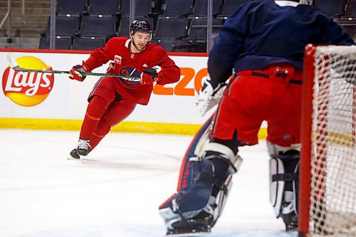 MIKE DEAL / WINNIPEG FREE PRESS
Winnipeg Jets' Neal Pionk (4) during practice at Canada Life Centre Monday morning.
211213 - Monday, December 13, 2021.