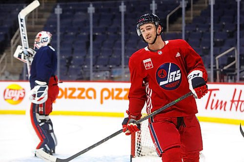 MIKE DEAL / WINNIPEG FREE PRESS
Winnipeg Jets' Neal Pionk (4) during practice at Canada Life Centre Monday morning.
211213 - Monday, December 13, 2021.