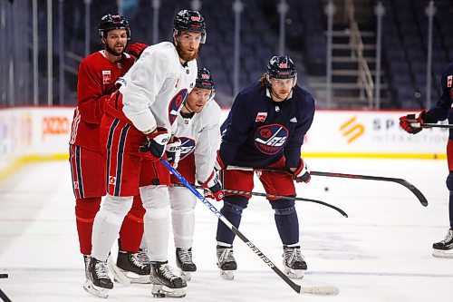 MIKE DEAL / WINNIPEG FREE PRESS
Winnipeg Jets' Josh Morrissey (44), Pierre-Luc Dubois (80), Paul Stastny (25) and Nathan Beaulieu (28) during practice at Canada Life Centre Monday morning.
211213 - Monday, December 13, 2021.
