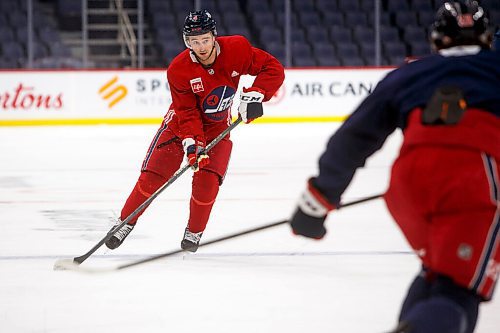 MIKE DEAL / WINNIPEG FREE PRESS
Winnipeg Jets' Neal Pionk (4) during practice at Canada Life Centre Monday morning.
211213 - Monday, December 13, 2021.