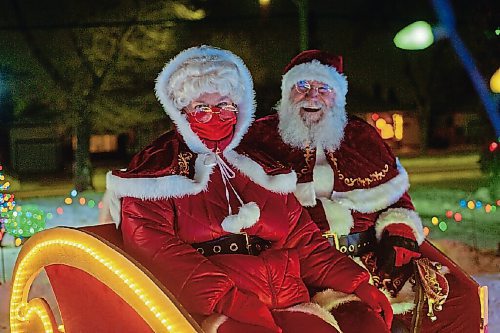 Canstar Community News Brad and Roxanne Wallace don magnificent costumes in their custom-built sleigh.