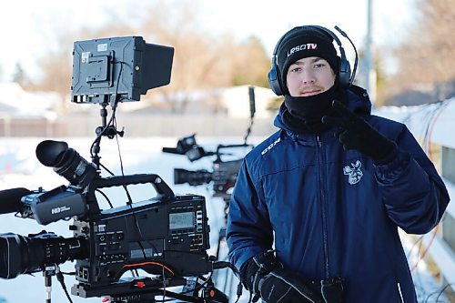 Canstar Community News Kyle Bergantim works a football game at East Side Eagles Field. He is enrolled in the broadcast media program at the Louis Riel Arts and Technology Centre.