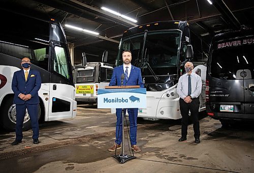 JESSICA LEE / WINNIPEG FREE PRESS

Lagimodière MLA Andrew Smith (centre) announces with Economic Development and Jobs Minister Jon Reyes (left) and John Fehr, General Manager of Beaver Bus Lines, a $1.92-million program to support bus and air charter companies affected by the COVID-19 pandemic on December 13, 2021 at Beaver Buslines head office.


Reporter: Gabby










