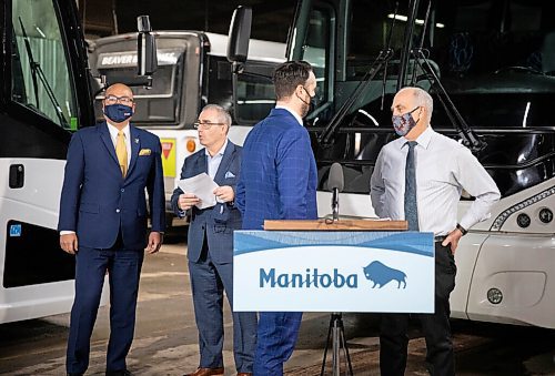 JESSICA LEE / WINNIPEG FREE PRESS

Key parties chat at Beaver Buslines headquarters after the announcement of a $1.92-million program to support bus and air charter companies affected by the COVID-19 pandemic on December 13, 2021. From left to right: Economic Development and Jobs Minister Jon Reyes, Chuck Davidson, CEO of Manitoba Chamber of Commerce, Lagimodière MLA Andrew Smith, and John Fehr, General Manager of Beaver Bus Lines.


Reporter: Gabby










