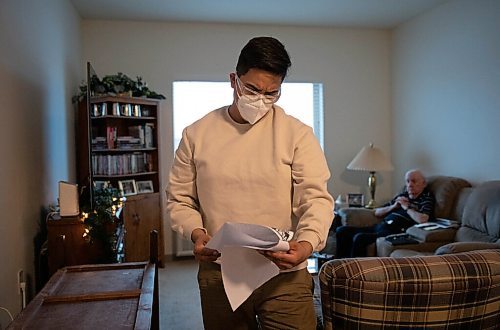 JESSICA LEE / WINNIPEG FREE PRESS

Raini Bowers builds furniture for his client Terrence Mills on December 14, 2021 in Mills residence. During the pandemic, Bowers turned towards freelance building furniture and now its a side hustle for him.

Reporter: Gabby










