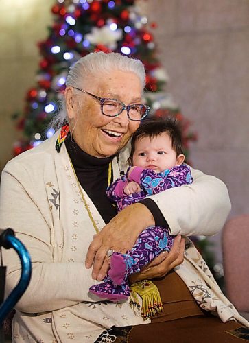 RUTH BONNEVILLE / WINNIPEG FREE PRESS

LOCAL - Ind support

Elder Mae Louise Campbell, co-founder, Clan Mothers Healing Village, holds her 2 month old great-grandchild, Grace at announcement for provincial government funding support for at-risk Indigenous Women and Girls at the Legislative Building Tuesday. 

Also in attendance: Premier Heather Stefanson Families Minister Rochelle Squires
Sport, Culture and Heritage Minister Cathy Cox Elder Billie Schibler, Clan Mothers Elders Council.

See Carol's story.

Dec14th,  2021
