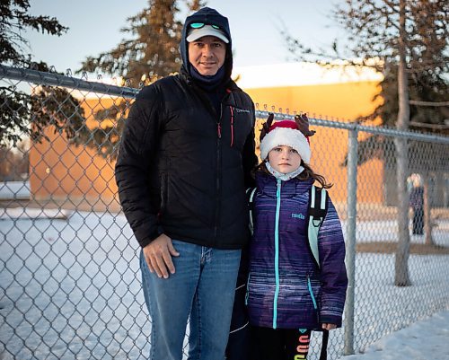 JESSICA LEE / WINNIPEG FREE PRESS

Andre Martel and his grade 2 daughter Charlotte are photographed outside École Dieppe on December 14, 2021.

Reporter: Maggie










