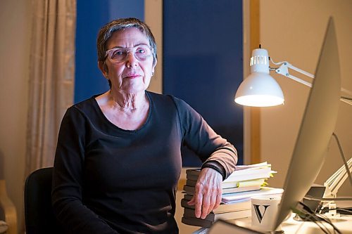 MIKAELA MACKENZIE / WINNIPEG FREE PRESS

Virginia Page Jähne, a 72-year-old PhD student at the U of M who is hesitant about the university's plans to fully reopen to pre-pandemic levels in early 2022, poses for a portrait in her home work space in Winnipeg on Thursday, Dec. 16, 2021. For Maggie story.
Winnipeg Free Press 2021.