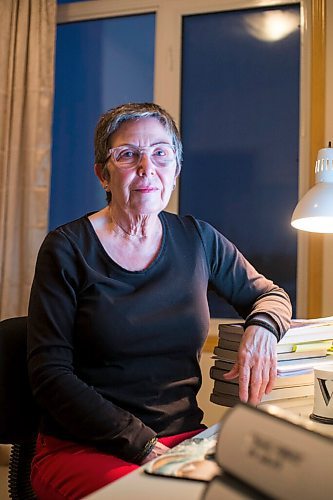 MIKAELA MACKENZIE / WINNIPEG FREE PRESS

Virginia Page Jähne, a 72-year-old PhD student at the U of M who is hesitant about the university's plans to fully reopen to pre-pandemic levels in early 2022, poses for a portrait in her home work space in Winnipeg on Thursday, Dec. 16, 2021. For Maggie story.
Winnipeg Free Press 2021.