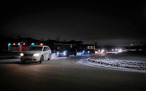 JESSICA LEE / WINNIPEG FREE PRESS

Cars pass the street that Dr. Brent Roussin allegedly lives on in Headingley, Manitoba, while honking their horns on December 16, 2021. The group intend to send a message to Roussin and other politicians, saying that they are watching them and wont be told what to do.












