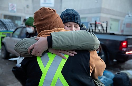 JESSICA LEE / WINNIPEG FREE PRESS

Irene Sanderson (right), girlfriend of Elijah Woodhouse, gives him a big hug at Main Street Project on December 17, 2021 after Woodhouse walked 231 km to raise awareness about addiction and homelessness. He handed out snacks while walking and also gathered clothing and money donations for the Main Street Project. They are joined by family members and Main Street Project community members who celebrated the completion of Woodhouses walk.














