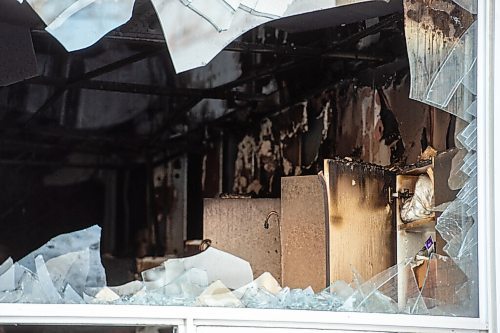 Mike Sudoma / Winnipeg Free Press
A scorched first floor classroom sits behind a pane of broken glass after a fire broke out in St James Collegiate Sunday morning
December 19, 2021