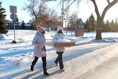 RUTH BONNEVILLE / WINNIPEG FREE PRESS
 
Local - Riverview Fireworks 

Riverview volunteers Brenda Neumann (pink toque) and Krystal Patey, deliver to the  invitations (to watch the display) to about 250 homes around Riverview on Monday morning.

For the second year, local commercial realtor Cushman & Wakefield Stevenson is putting on a huge fireworks display on New Year's Eve at Riverview. In fact, it's three displays to ensure it's visible to people in every corner of the facility.

The fireworks are a big thank for the care given to Patricia McGarry, who spent her final days in care at Riverview and whose sons run Cushman & Wakefield Stevenson.It sounds like the company plans to do something every year from here on in, whether fireworks or a carnival or whatever.



Dec 20th,  2021
