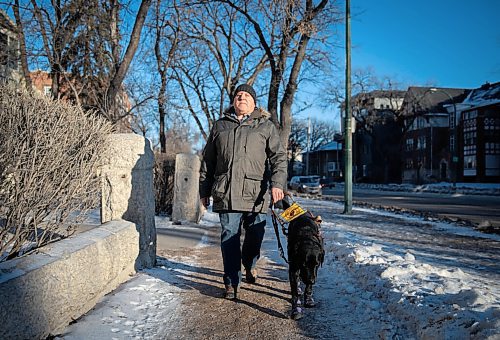 JESSICA LEE / WINNIPEG FREE PRESS

Vic Pereira walks with his guide dog Porthos near his home on Wellington Crescent on December 20, 2021. Pereira thinks the city should require those who own homes or businesses to shovel the sidewalks beside them.

Reporter: Joyanne













