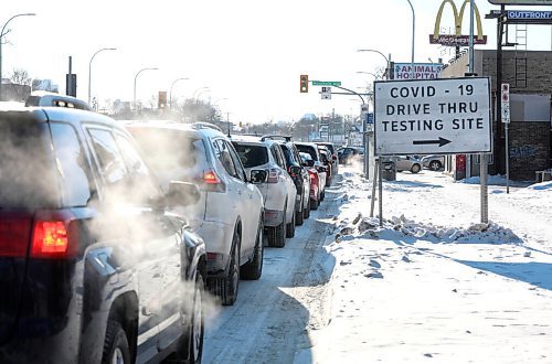 RUTH BONNEVILLE / WINNIPEG FREE PRESS
 
Local - COVID Testing site

Cars lineup along Main Street,  Charles St. and in the  drive-thru COVID Testing site on Main Street on Friday afternoon.  

Dec 21th,  2021
