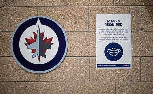 JESSICA LEE / WINNIPEG FREE PRESS

A sign encouraging masks is photographed at the Canada Life Centre on December 21, 2021.

Reporter: Katie













