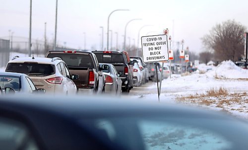 RUTH BONNEVILLE / WINNIPEG FREE PRESS
 
Local - Nairn COVID lineups

Vehicles wait in long line that starts on Nairn Ave. to Thomas Ave. and Keenleyside Street to get into Nairn's, Drive-in COVID testing site Wednesday.  

Dec 22nd,  2021
