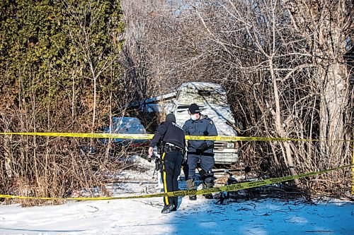 MIKAELA MACKENZIE / WINNIPEG FREE PRESS

Police investigate a scene where human remains were found in Oakville, Manitoba on Wednesday, Dec. 22, 2021. For Chris Kitching story.
Winnipeg Free Press 2021.