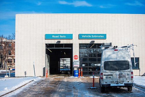 MIKAELA MACKENZIE / WINNIPEG FREE PRESS

A repair van sits in front of the 1284 Main Street testing site, which is closed because of two separate entrance door incidents (an accident and a malfunction), in Winnipeg on Friday, Dec. 24, 2021.  For --- story.
Winnipeg Free Press 2021.