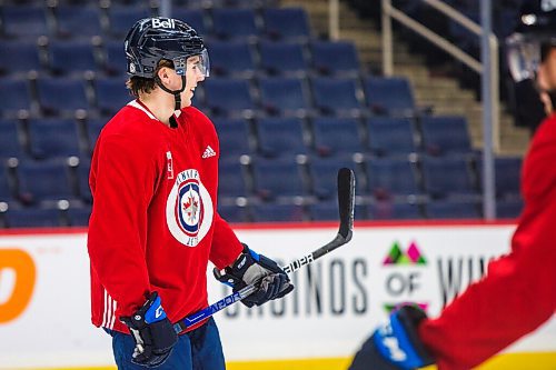 MIKAELA MACKENZIE / WINNIPEG FREE PRESS

Ville Heinola (14) skates at Jets practice at the Canada Life Centre in Winnipeg on Monday, Dec. 27, 2021.  For Mike McIntyre story.
Winnipeg Free Press 2021.