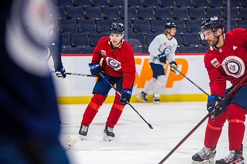 MIKAELA MACKENZIE / WINNIPEG FREE PRESS

Ville Heinola (14) skates at Jets practice at the Canada Life Centre in Winnipeg on Monday, Dec. 27, 2021.  For Mike McIntyre story.
Winnipeg Free Press 2021.