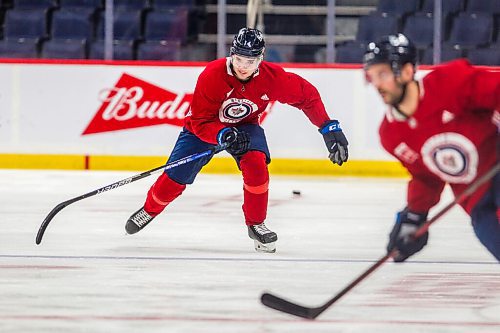 MIKAELA MACKENZIE / WINNIPEG FREE PRESS

Ville Heinola (14) skates at Jets practice at the Canada Life Centre in Winnipeg on Monday, Dec. 27, 2021.  For Mike McIntyre story.
Winnipeg Free Press 2021.