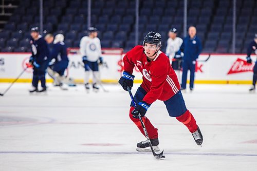 MIKAELA MACKENZIE / WINNIPEG FREE PRESS

Ville Heinola (14) skates at Jets practice at the Canada Life Centre in Winnipeg on Monday, Dec. 27, 2021.  For Mike McIntyre story.
Winnipeg Free Press 2021.