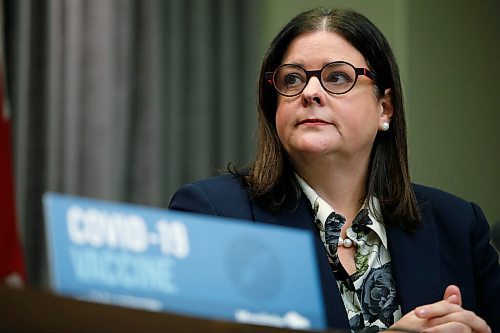 JOHN WOODS / WINNIPEG FREE PRESS
Premier Heather Stefanson listens in as Dr. Brent Roussin, Manitoba chief public health officer, announces further restrictions during the province's latest COVID-19 update at the Manitoba legislature in Winnipeg Monday, December 27, 2021.  

Re: ?