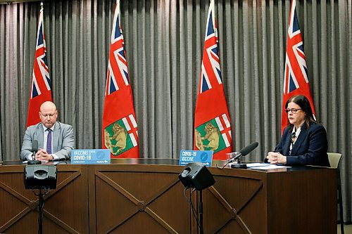 JOHN WOODS / WINNIPEG FREE PRESS
Dr. Brent Roussin, Manitoba chief public health officer, and premier Heather Stefanson speak during the province's latest COVID-19 update at the Manitoba legislature in Winnipeg Monday, December 27, 2021.  

Re: ?