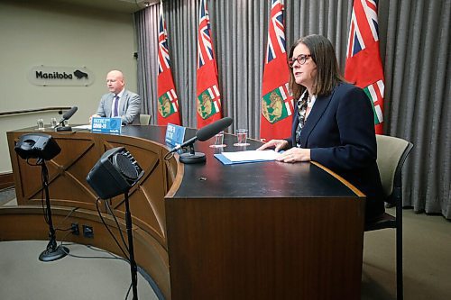 JOHN WOODS / WINNIPEG FREE PRESS
Dr. Brent Roussin, Manitoba chief public health officer, and premier Heather Stefanson speak during the province's latest COVID-19 update at the Manitoba legislature in Winnipeg Monday, December 27, 2021.  

Re: ?