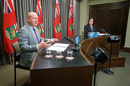 JOHN WOODS / WINNIPEG FREE PRESS
Dr. Brent Roussin, Manitoba chief public health officer, and premier Heather Stefanson speak during the province's latest COVID-19 update at the Manitoba legislature in Winnipeg Monday, December 27, 2021.  

Re: ?