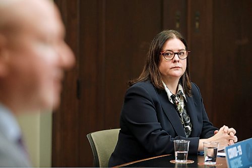 JOHN WOODS / WINNIPEG FREE PRESS
Premier Heather Stefanson listens in as Dr. Brent Roussin, Manitoba chief public health officer, announces further restrictions during the province's latest COVID-19 update at the Manitoba legislature in Winnipeg Monday, December 27, 2021.  

Re: ?