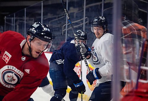 JESSICA LEE / WINNIPEG FREE PRESS

Jets players (from left to right) Nate Schmidt, Kristian Reichel and Mark Scheifele are photographed at practice on December 28, 2021.









