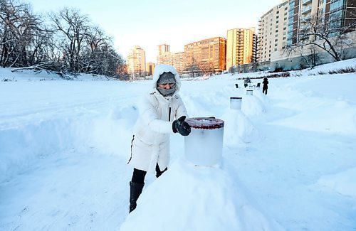 RUTH BONNEVILLE / WINNIPEG FREE PRESS

LOCAL - Helix path

Hazel Borys  tries to light one of her candles along the Helix path on the Assiniboine River Wednesday. 

Story  focuses on what goes into building the path and the ice lanterns they craft for light/decoration. 



Dec 29th,,  2021
